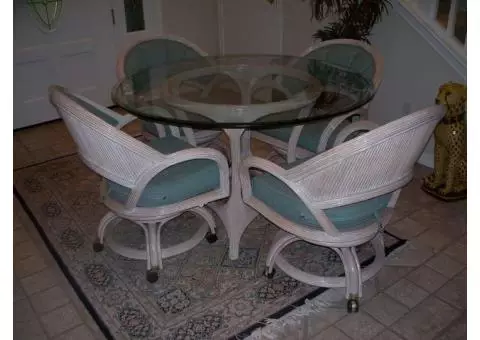 Round glass top table and 4 matching chairs